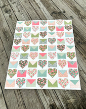 Load image into Gallery viewer, Colorful quilt with heart patterns, floral designs, and pastel colors in cotton fabric, perfect for home decor.
