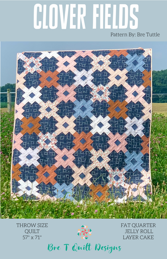 Clover Fields throw quilt, 57" x 71", featuring blue, brown, and pink geometric patterns.
