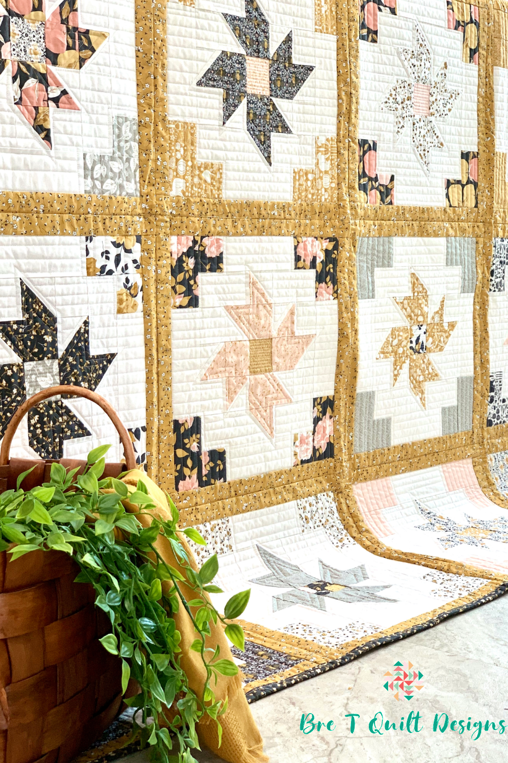 Colorful quilt featuring floral patterns, geometric shapes, and gold accents, perfect for home decor.