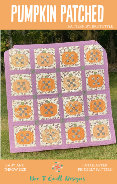 Pumpkin Patched quilt in baby and throw size, featuring orange and floral patterns on a purple background.